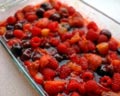 [The cooked compot offers up soft fruit nestling in a sweet juice]