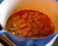 [Marinaded meat and brown stuff simmering]
